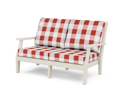 Country Living Wovendale Deep Seating Loveseat in Sand / Buffalo Plaid Crimson