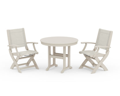POLYWOOD® Coastal Folding Chair 3-Piece Round Dining Set in Sand / Parchment Sling